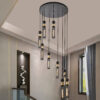 24" Modern Industrial Multi-Light Pendant Chandelier - 9-Light Black and Gold Adjustable Ceiling Light Fixture with Mesh Cylinder Shades for Living Room, Dining Room, or Staircase (Bulb Not Included)