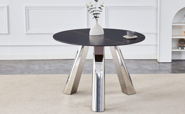 60a7e67eed7e47d1b96b5438ca7800b4_78f042d68fae2349bbd8f899bf5027fe A 42-inch burn stone round table with stainless steel legs can accommodate 4 or 6 diners