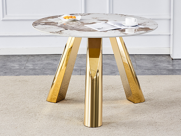6b4ae96ecd32433fac1c65778dcbd280_cd10a2a8875baa73642b4e0ce1a7bb52 A 42-inch stainless steel white pattern burning stone round table with gold legs Round table suitable for 2, 4 or 6 people