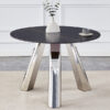 A 42-inch burn stone round table with stainless steel legs can accommodate 4 or 6 diners