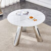 A 42-inch stainless steel leg round table with a marble top is suitable for use by four or six people