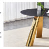 The 42-inch stainless steel gold-plated flamed granite round table with seating for 4 or 6 people is perfect for dining, entertaining, or as a conference table