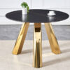 The 42-inch stainless steel gold-plated flamed granite round table with seating for 4 or 6 people is perfect for dining, entertaining, or as a conference table