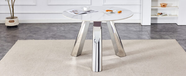 a6221d42efce448d8232890bdd97bd30_e9e7e0ae7feb03ce8b9b80b587ea58c8 A 42-inch stainless steel leg round table with a marble top is suitable for use by four or six people