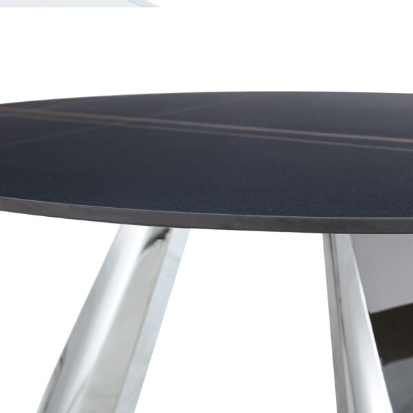 c37ba1d368f745d59aa0553b6c8b6470_fbd5b12126fb3095ce2c6d2dd071cfa2 A 42-inch burn stone round table with stainless steel legs can accommodate 4 or 6 diners