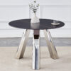 A 42-inch burn stone round table with stainless steel legs can accommodate 4 or 6 diners