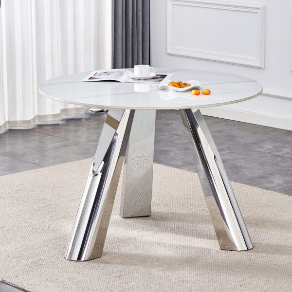 c5207bf1171f4316b420ee95af251761_7eb83e8950f2c7fb3c01805f7c47b79d A 42-inch stainless steel leg round table with a marble top is suitable for use by four or six people