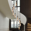 24" Modern Industrial Multi-Light Pendant Chandelier - 9-Light Black and Gold Adjustable Ceiling Light Fixture with Mesh Cylinder Shades for Living Room, Dining Room, or Staircase (Bulb Not Included)