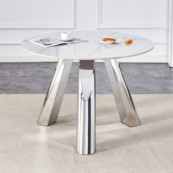 e240186c51b9491c96f113658ecdb903_1ad7da20d6dbb7553f6c04e0e252efb9 A 42-inch stainless steel leg round table with a marble top is suitable for use by four or six people