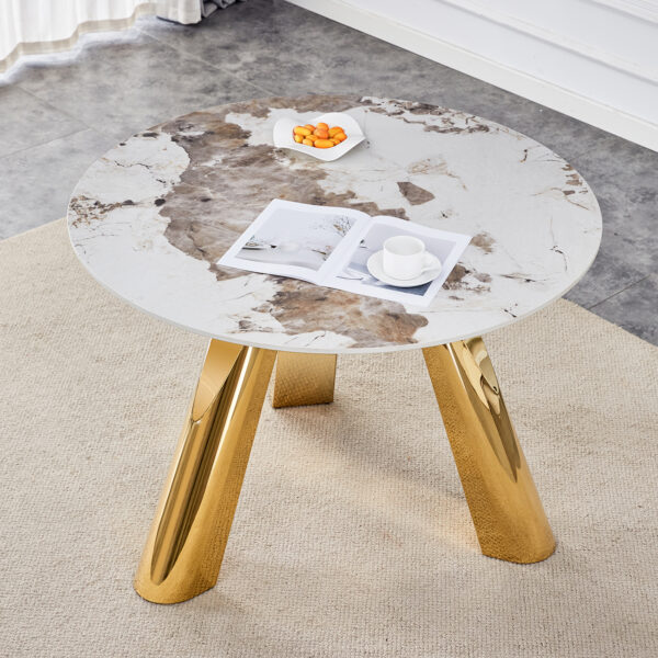 e9ef4b1f7eb64aad8fe39b5a9179da64_3fe825cd039bf23773af7a52b605d12b A 42-inch stainless steel white pattern burning stone round table with gold legs Round table suitable for 2, 4 or 6 people